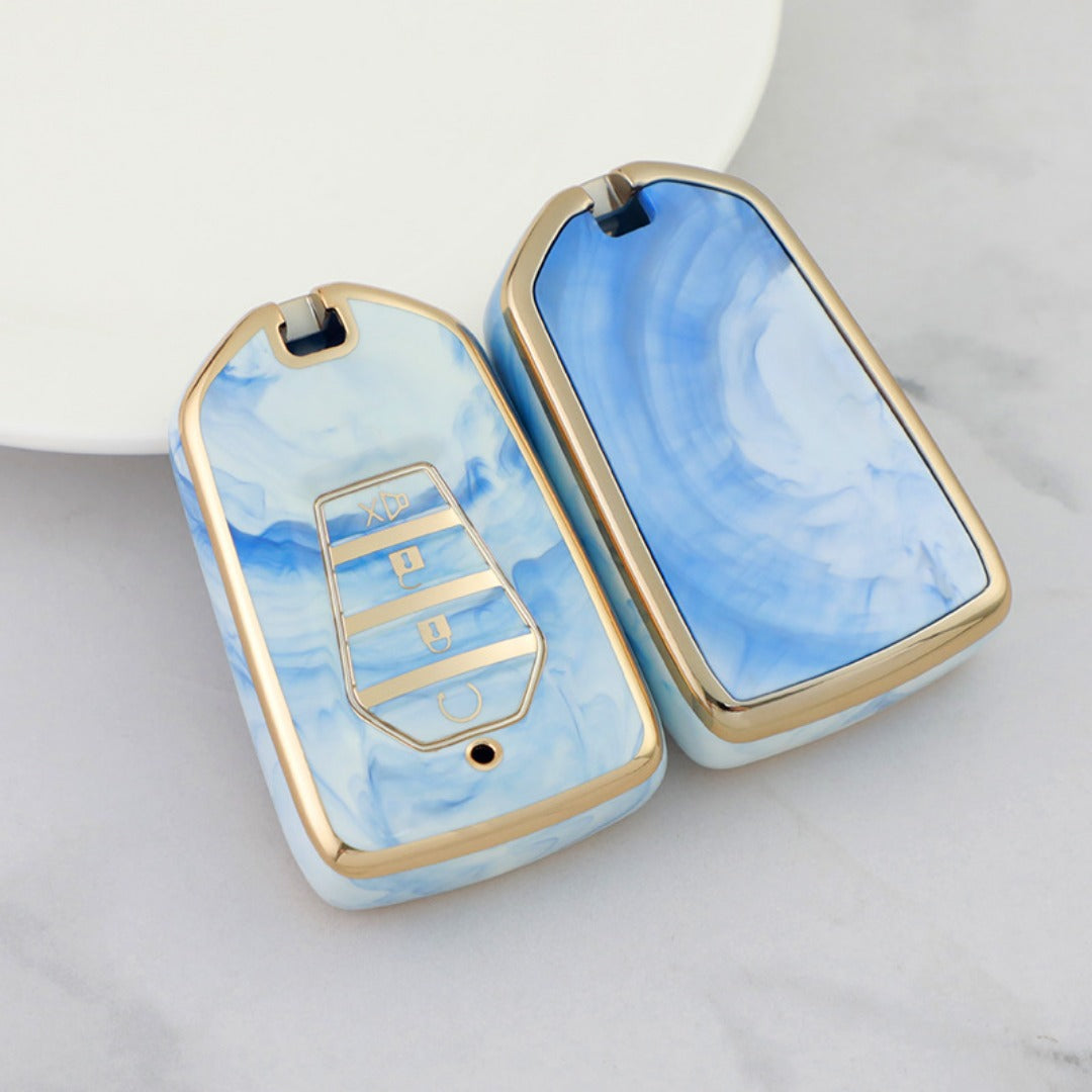 Isuzu Autoschlüsseletui, goldfarben mit Jade-Einlage